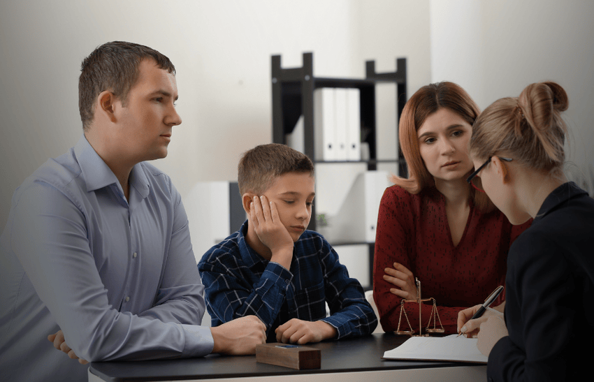 A family law attorney discussing child custody in Los Angeles with a family.