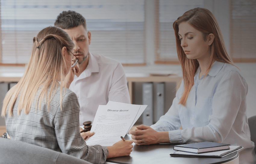 A Los Angeles divorce lawyer discussing matters of high asset divorce with clients.